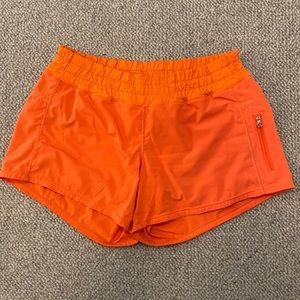 Lululemon Tracker Short in Orange Size 6